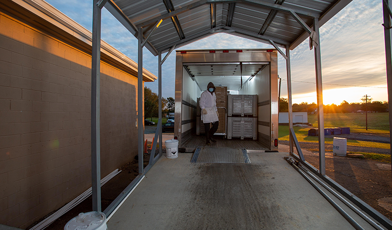 PCM Refrigerated Truck Being Loaded