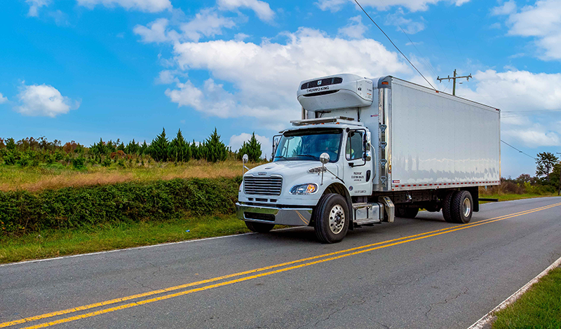 PCM Refrigerated Truck on the Road